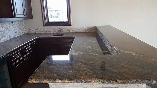 Undermount vs drop in sinks with stone countertops pros and cons